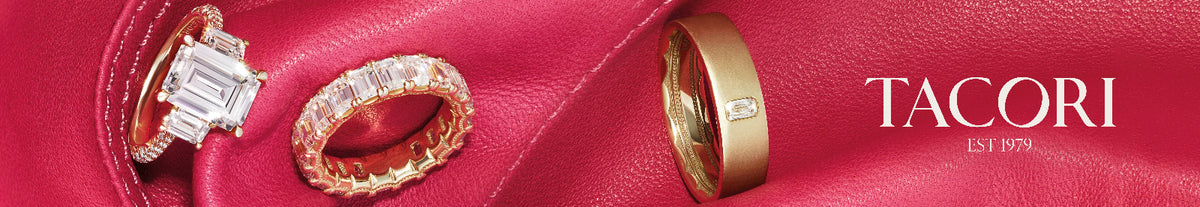 Three rings displayed on a rich pink leather surface, with the brand name TACORI EST 1979 in white text on the right.
