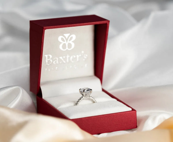 Diamond oval engagement ring with halo and matching wedding band